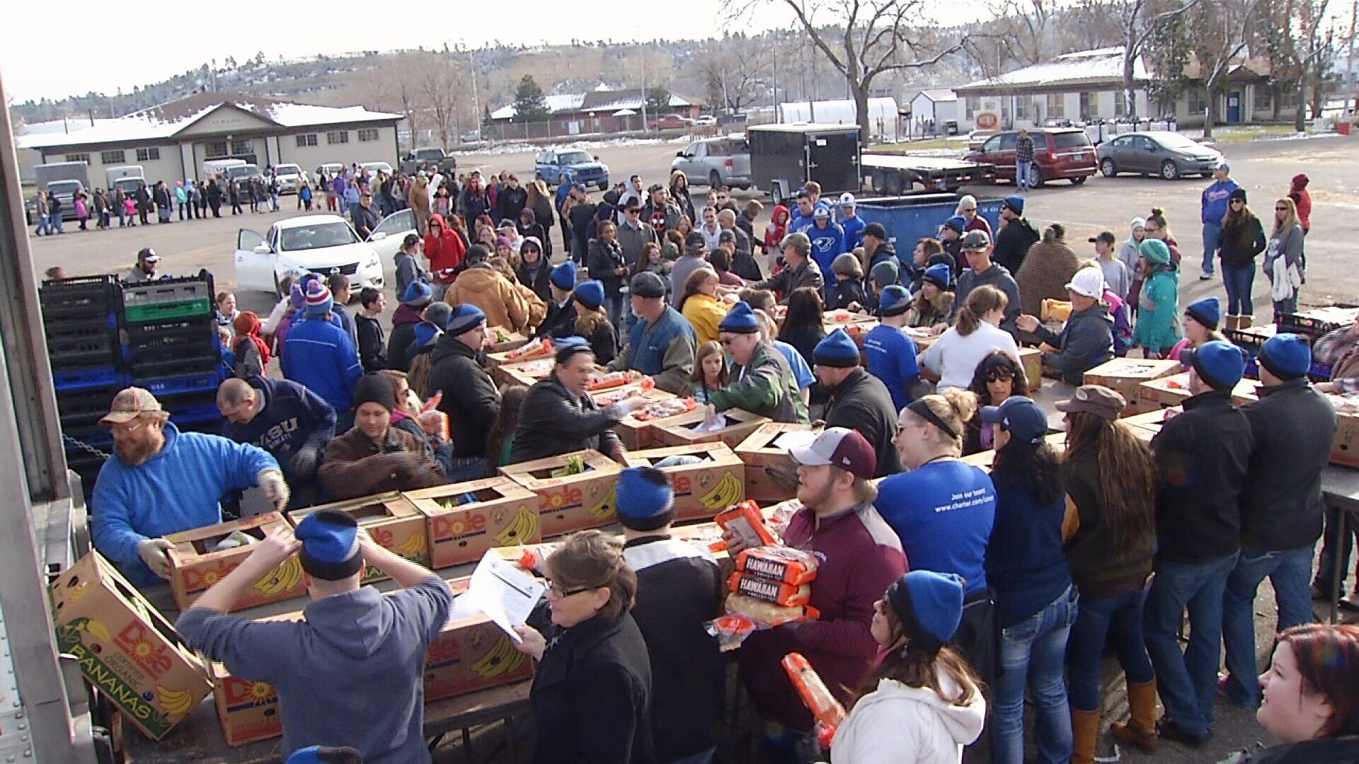 Hundreds in need of help this Thanksgiving waited patiently at the Metra Fairgrounds for a boxed meal. (MTN News Photo)