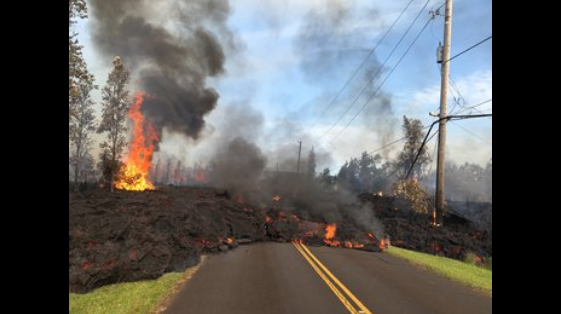 Lava from fissure 7 slowly advanced to the northeast on Hookapu Street in Leilani Estates subdivision on May 6, 2018.