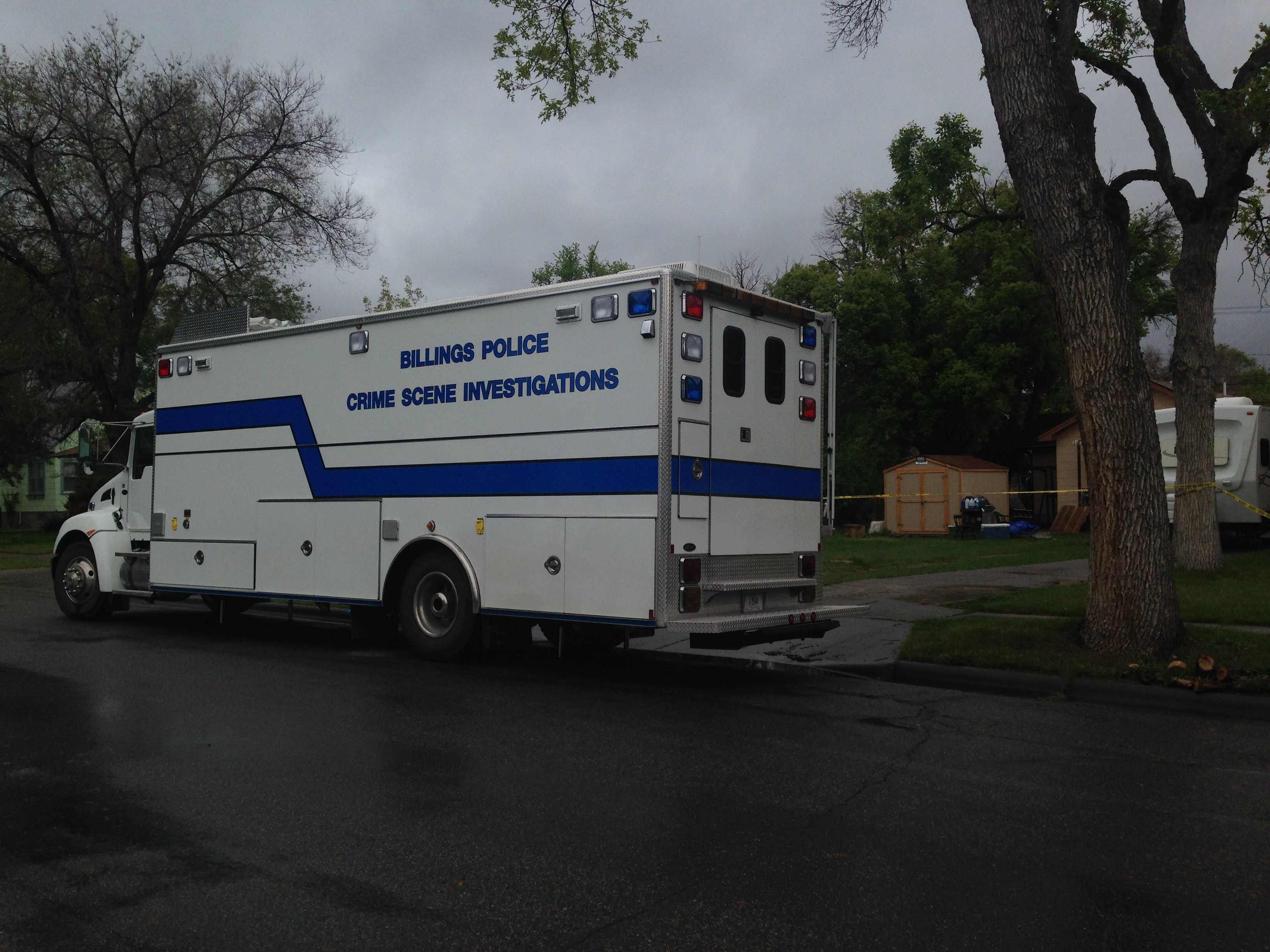 Billings Police Crime Scene Investigations van at 215 Alderson Avenue.